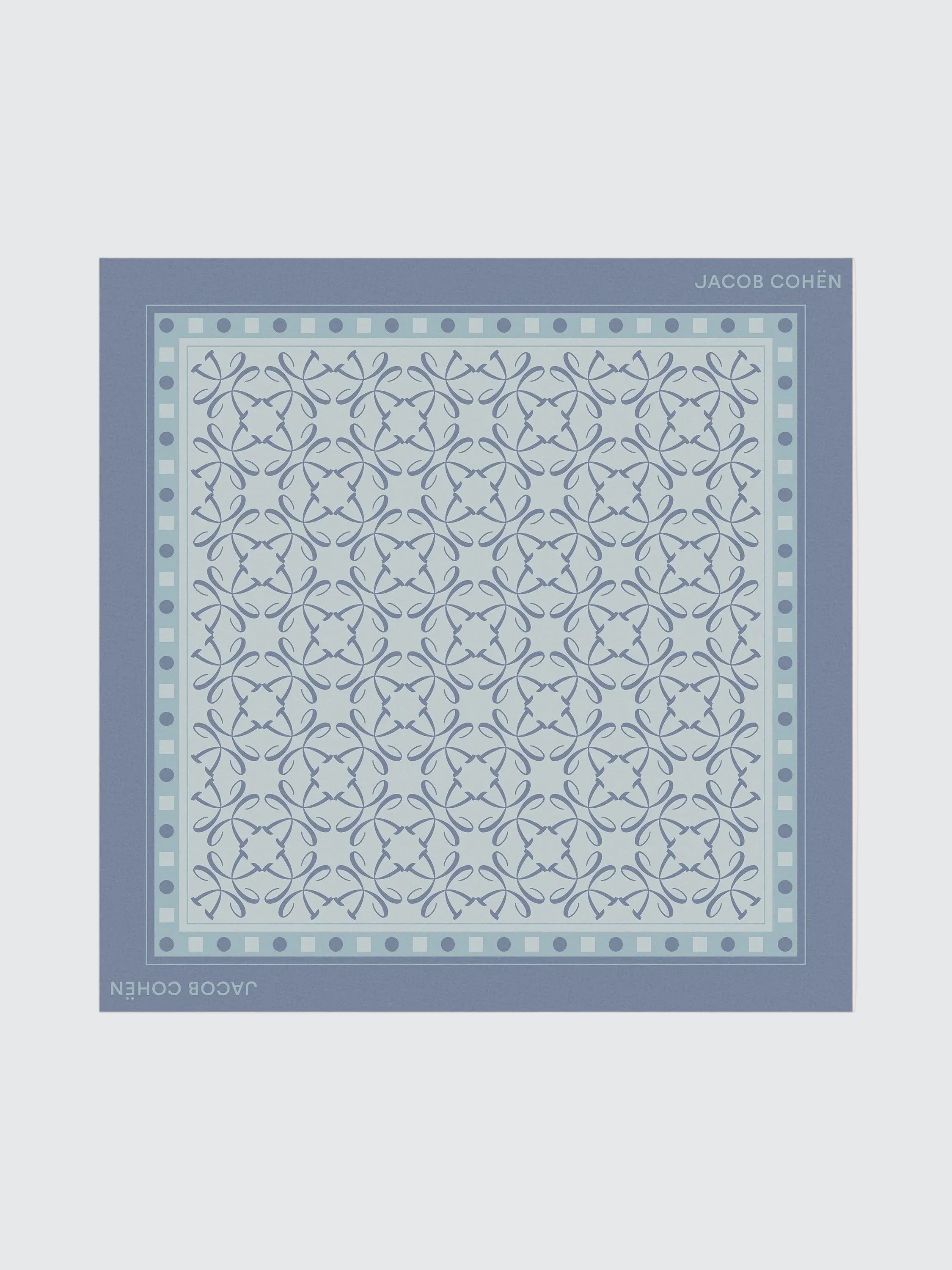 Blue patterned scarf with brand name on a light gray background