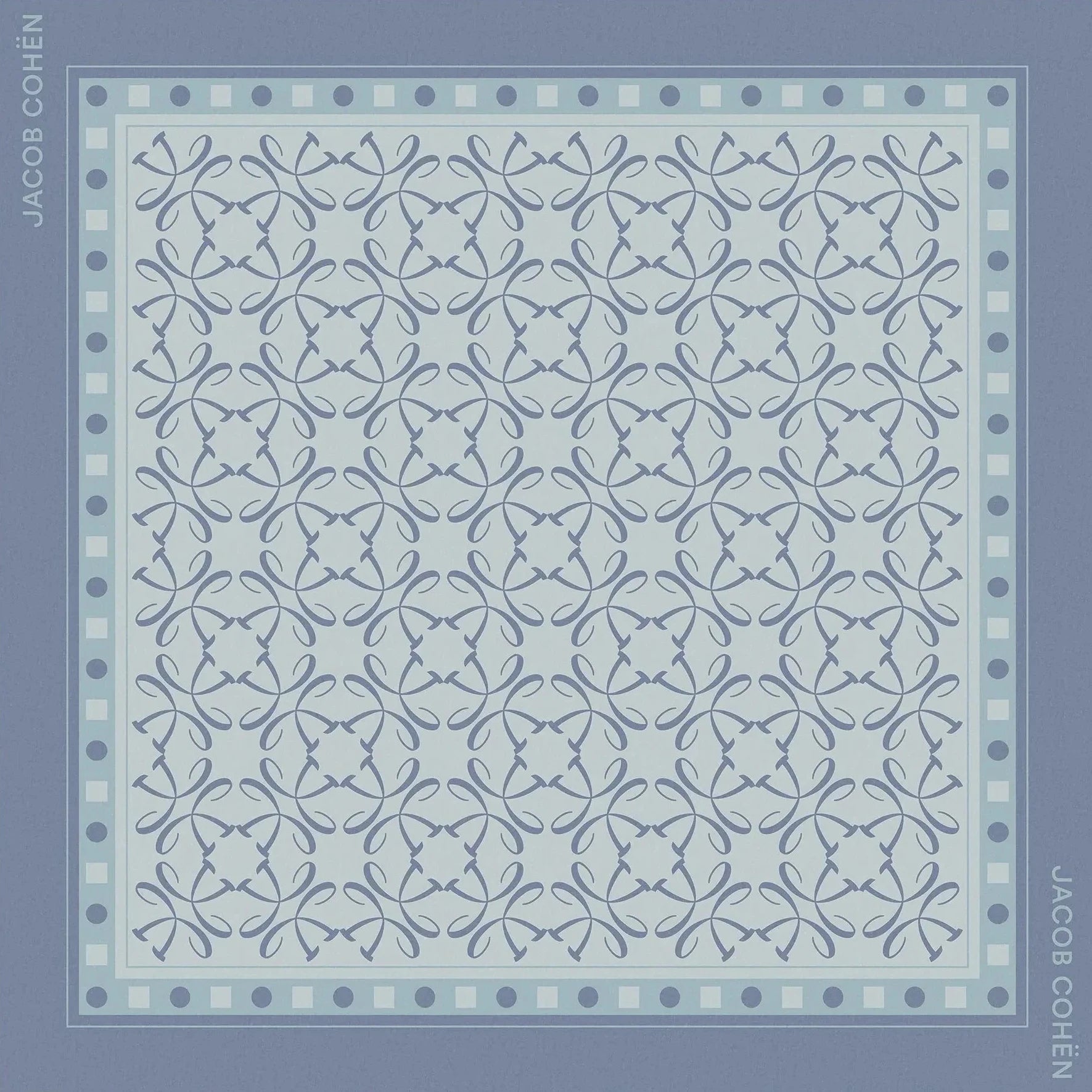 Blue patterned scarf with brand name on a light gray background