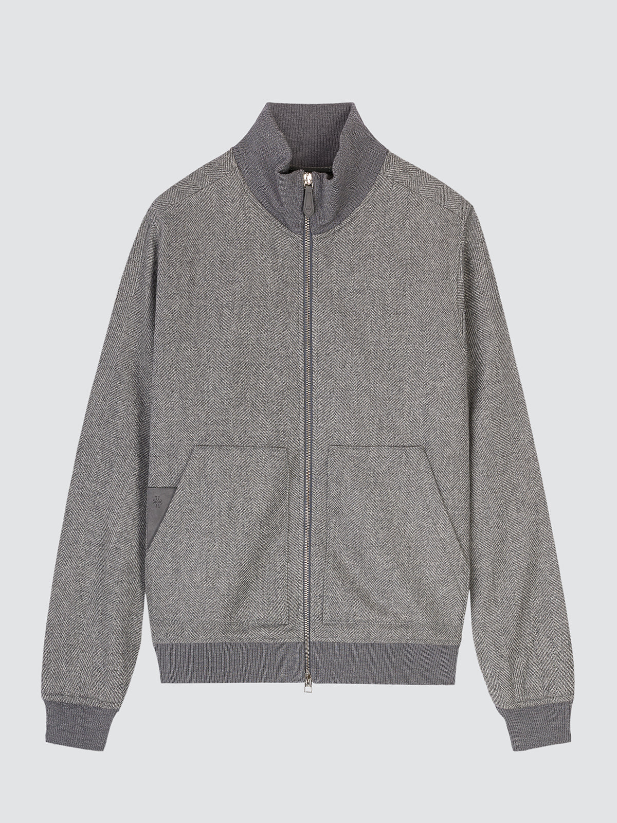 A gray zip-up jacket with a textured heathered fabric body, contrasting solid gray ribbed collar, cuffs, and hem, and two front patch pockets, shown against a light gray background.