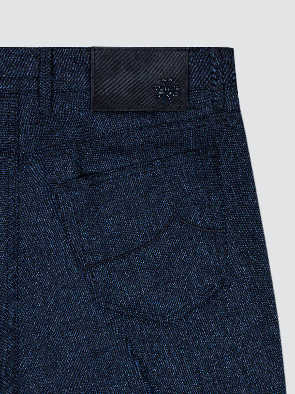 Navy blue sweatpants with a pocket on a white background