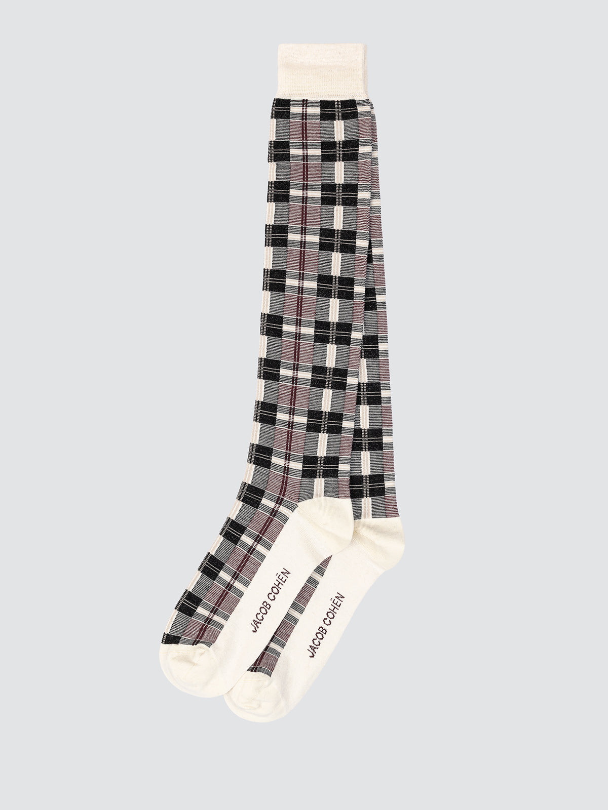 Plaid patterned socks with visible brand name on a light gray background