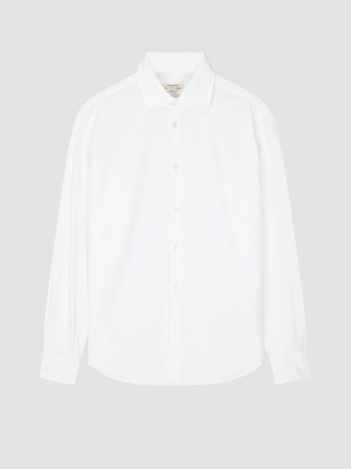 A white long-sleeve button-up shirt with a classic collar, displayed on a neutral light gray background.