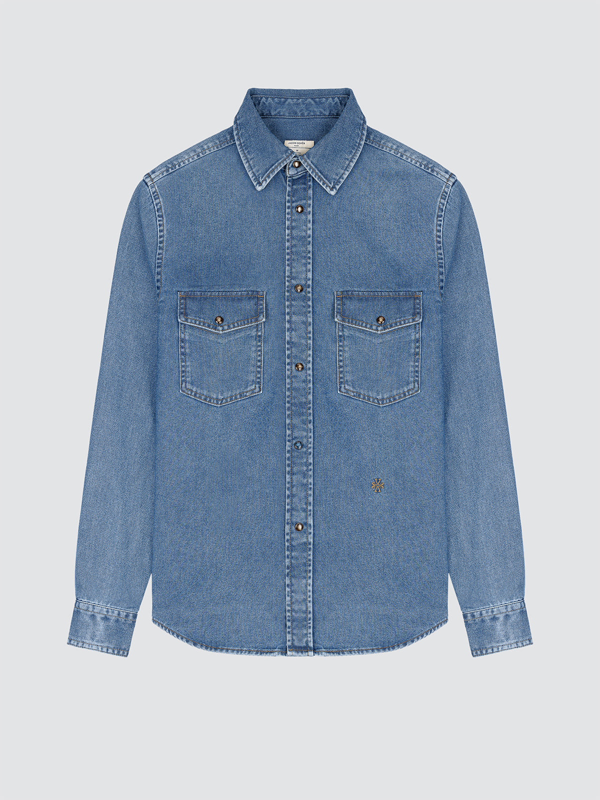 Blue denim shirt on a light gray background