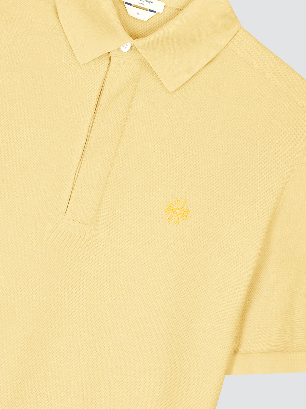 Polo piqué citron pastel - patte de boutonnage dissimulée
