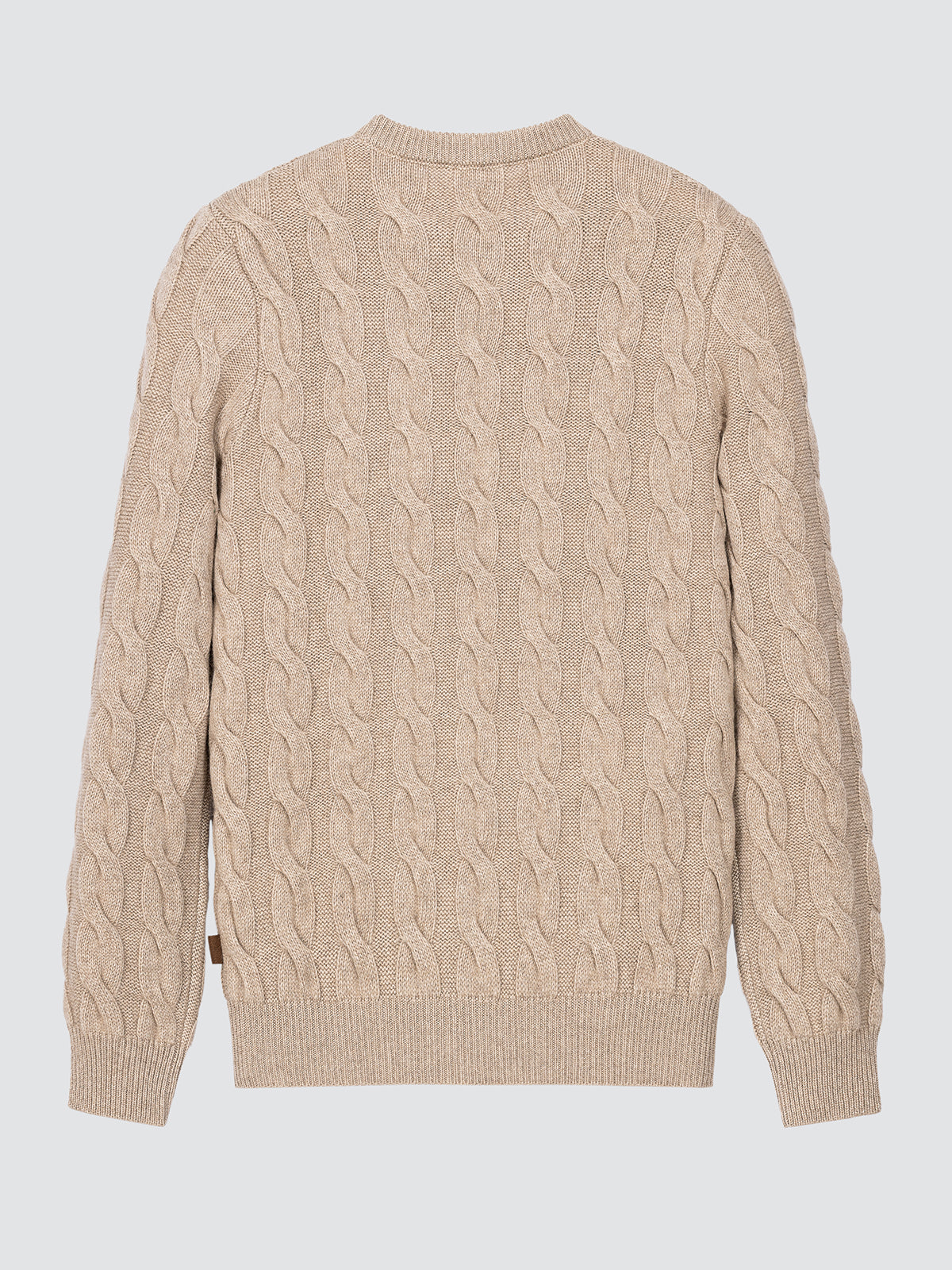 Beige cable knit sweater on a light gray background