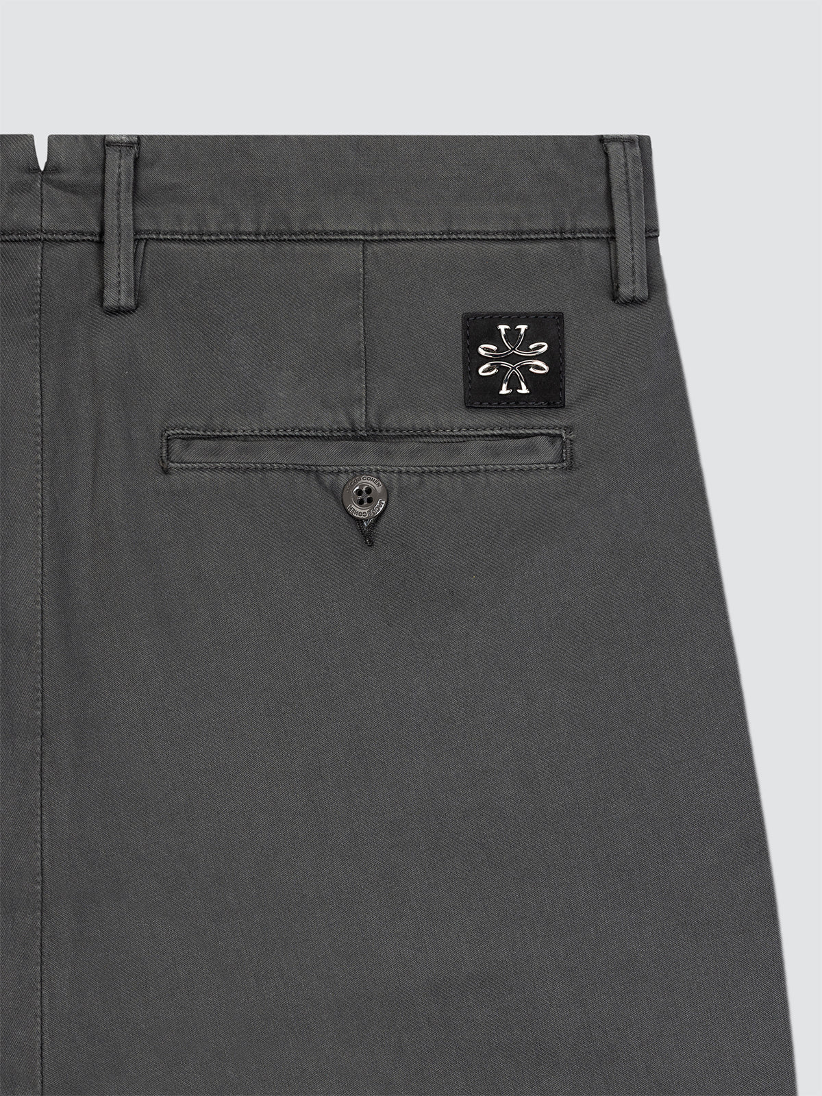 Gray pants with a brand logo Jacob Cohen on a light gray background
