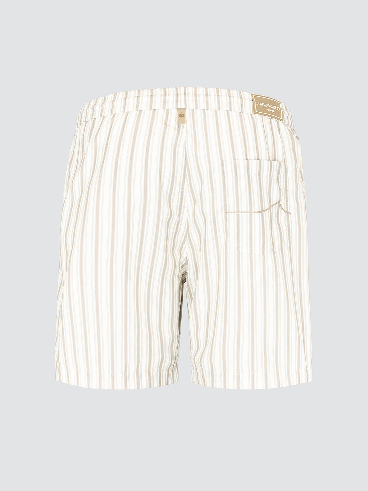Striped beige and white swim trunks by Jacob Cohën. Lightweight, quick-drying fabric with refined design. Ideal for beach and resort wear. Resort Capsule