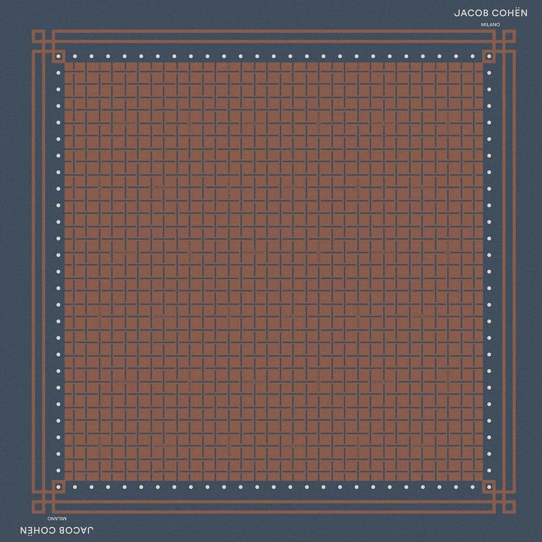 A square scarf laid flat against a light beige background. The scarf has a dark slate blue border with a fine grid pattern in the center, accented by small white dots and corner motifs.