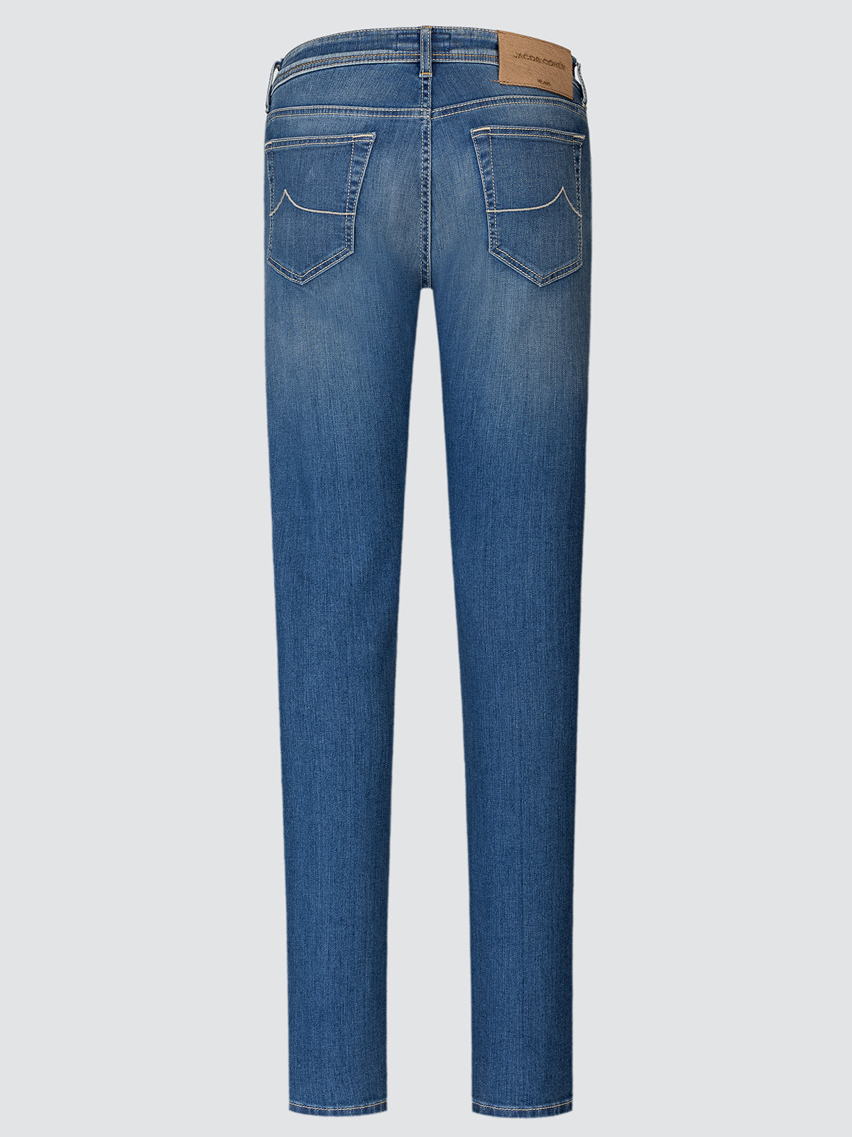 Blue jeans on a light gray background