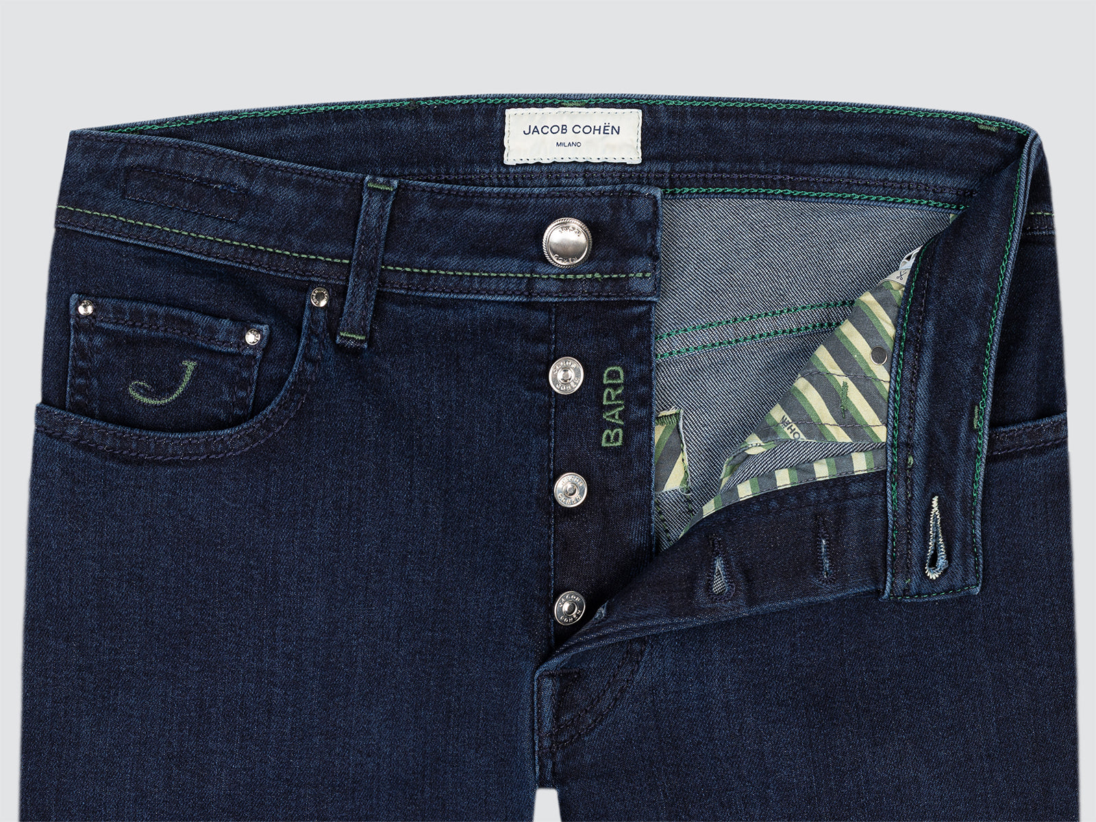 Dark blue jeans model Bard from Jacob Cohen with visible brand label on a light gray background