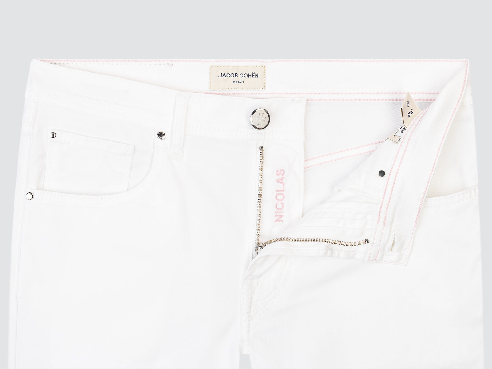 White short with brand label Jacob Cohen Milano on a light gray background
