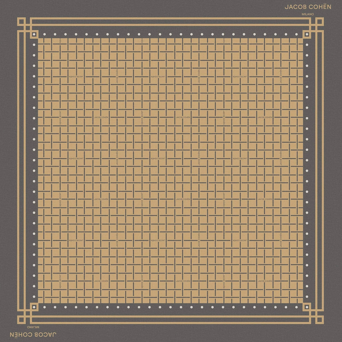 A square scarf laid flat on a light beige background. The scarf has a dark gray border with a fine gold grid pattern and a thicker gold geometric border, with the text 'JACOB COHEN' 