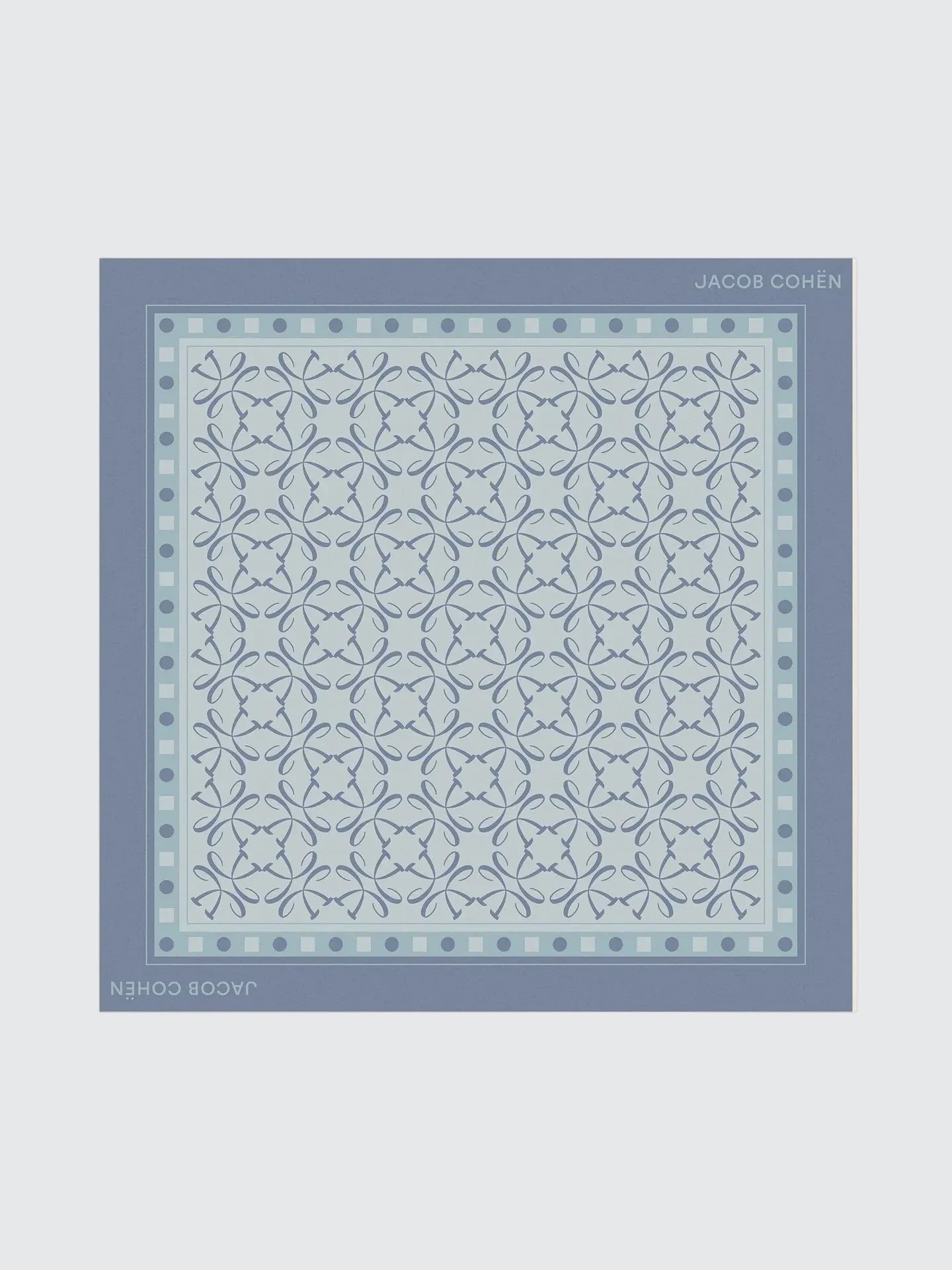 Blue patterned bandana with 'Jacquard' branding on a light grey background