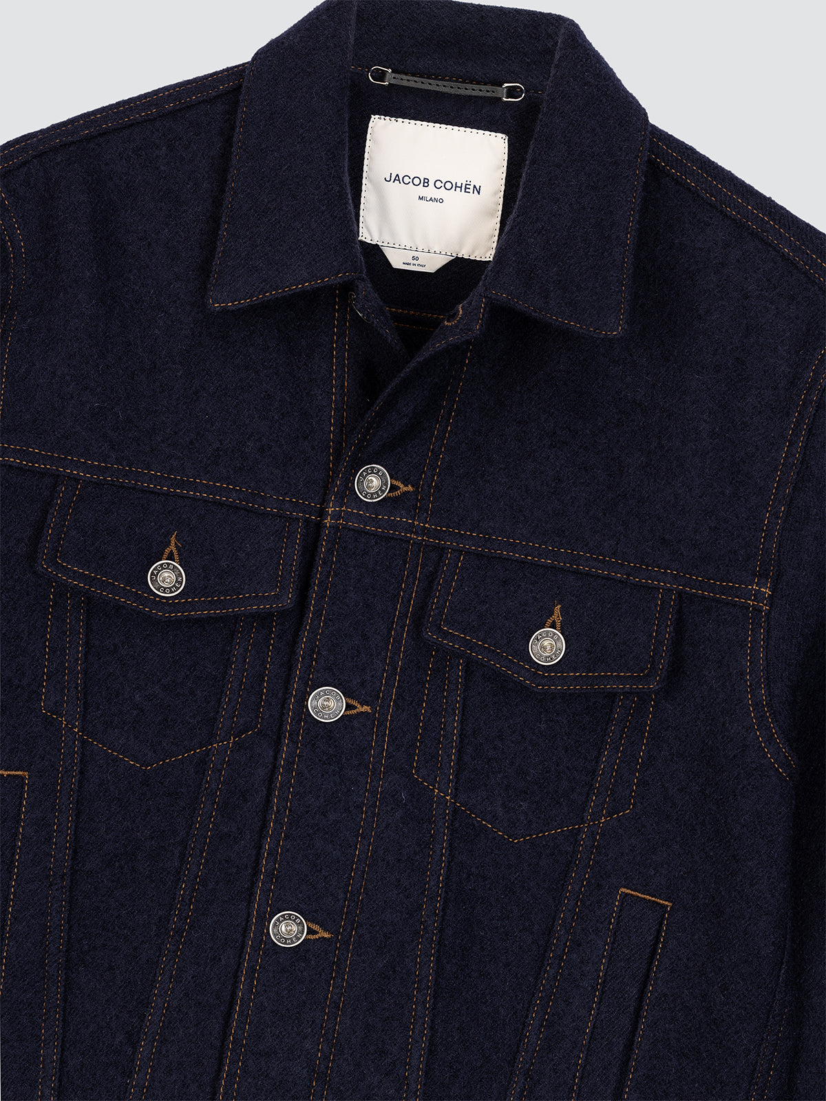Dark denim jacket wool with brand label on a light gray background