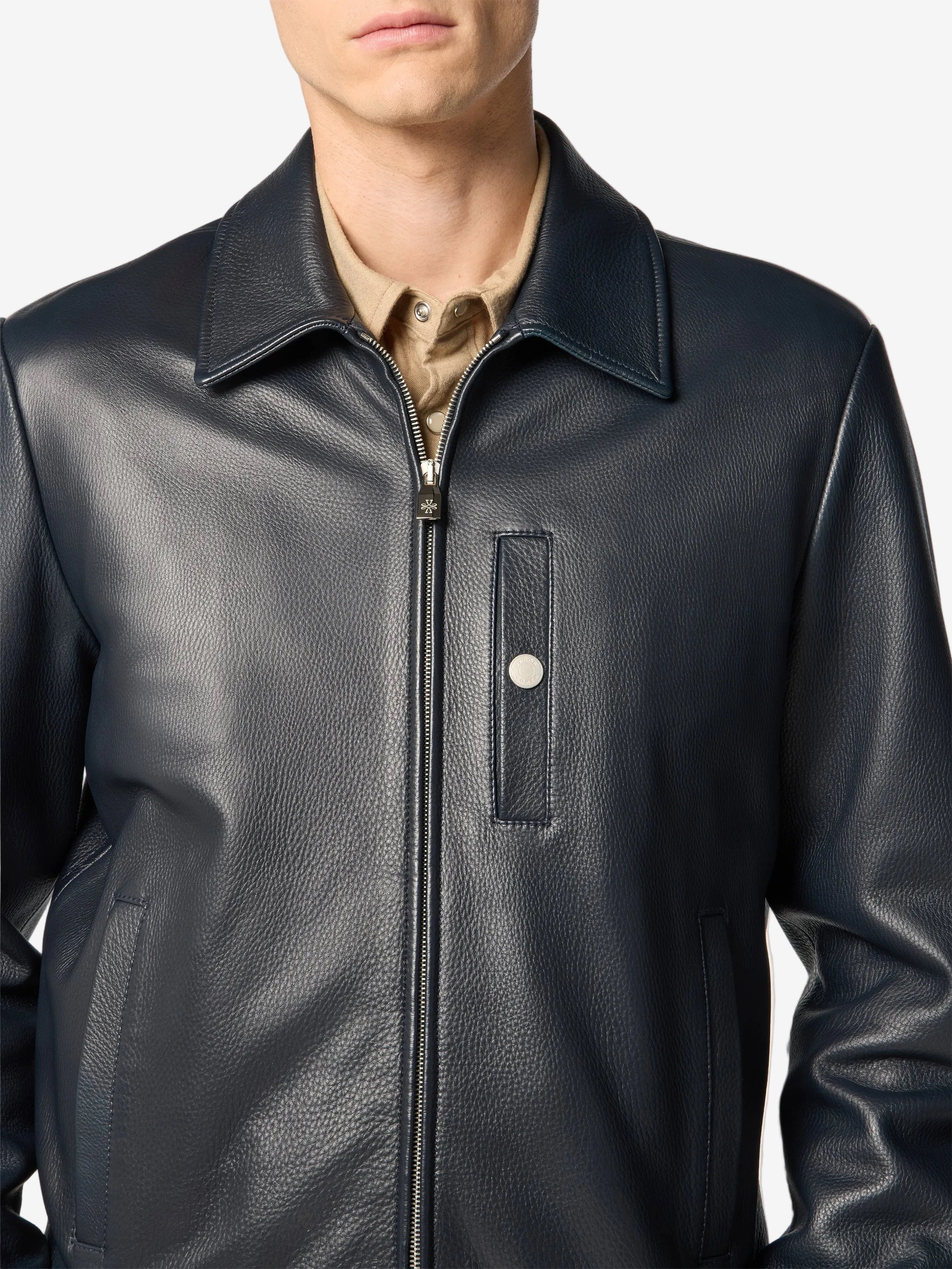 Blue leather jacket Jacob Cohen with a zip fly  on a neutral background