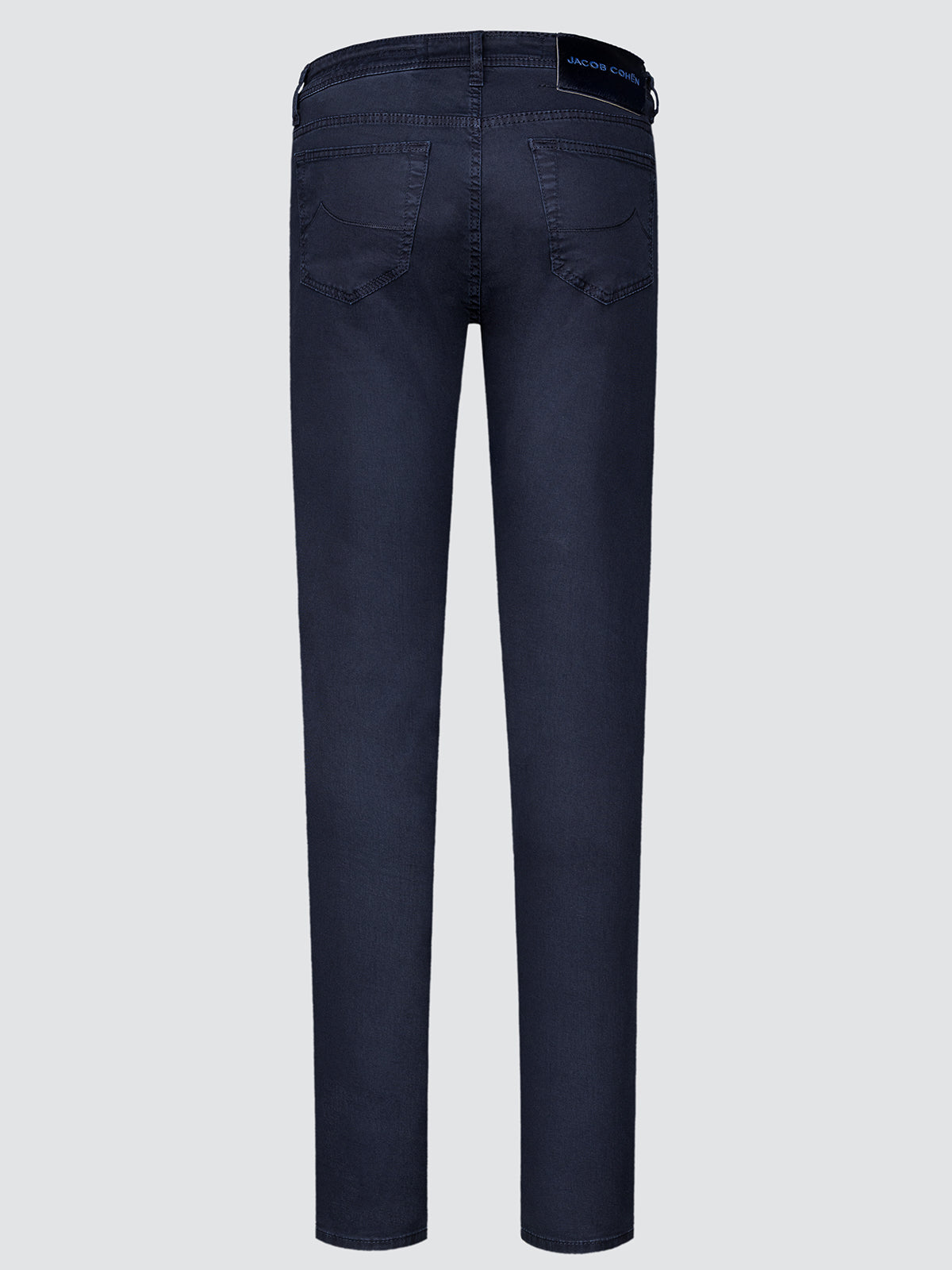 Navy blue jeans on a light gray background