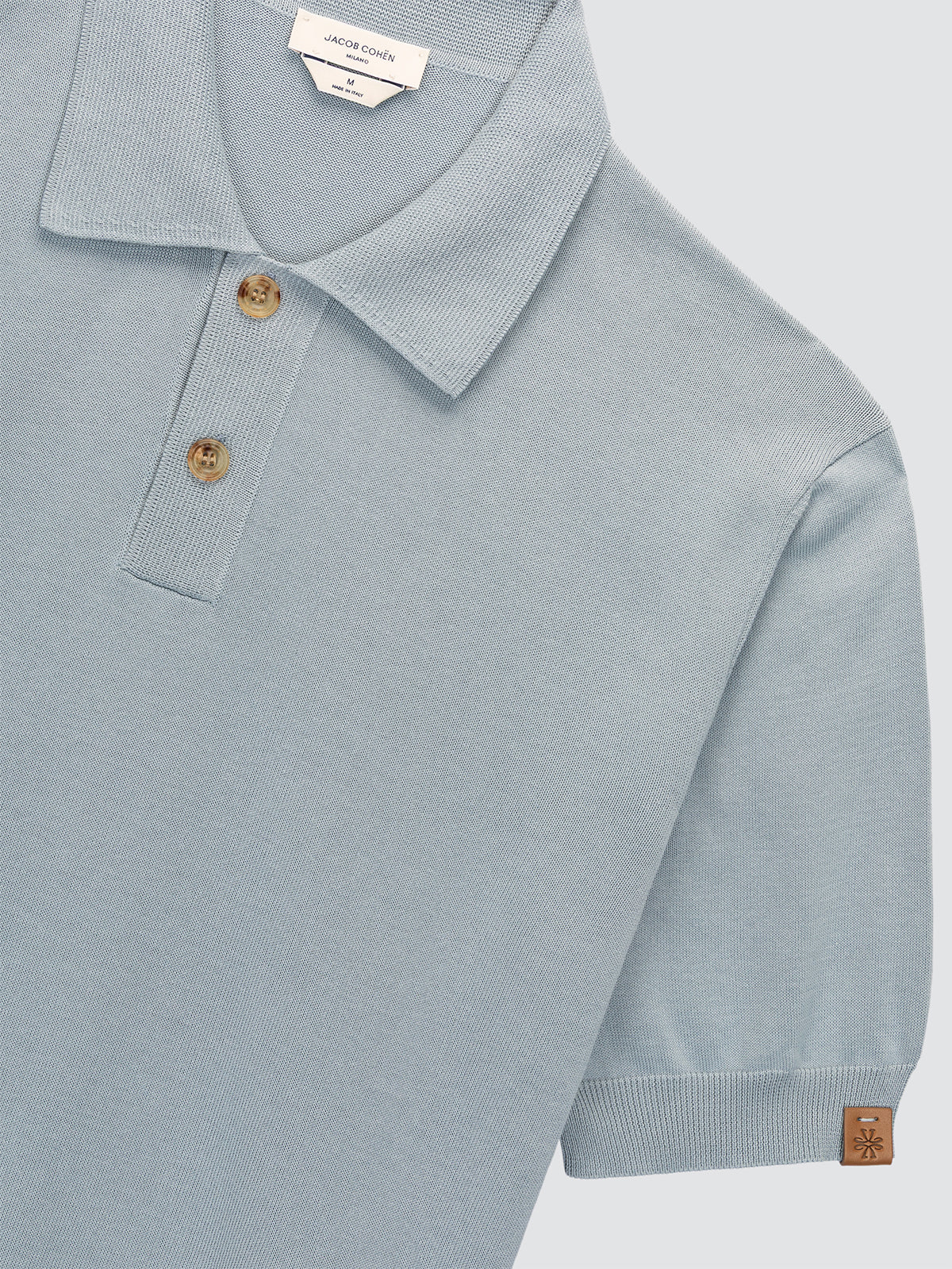Polo en coton brossé bleu poudré tricoté