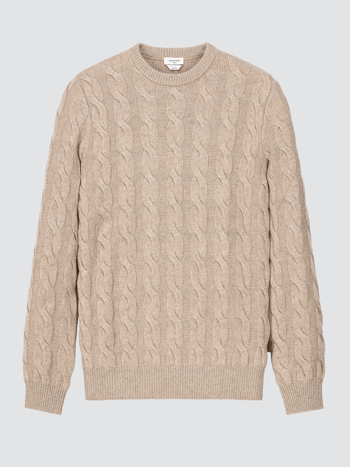 Beige Cashmere cable knit sweater on a light gray background by Jacob Cohën